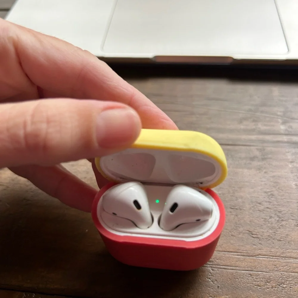 AirPods with Red and Yellow Case - Picture 2 of 7